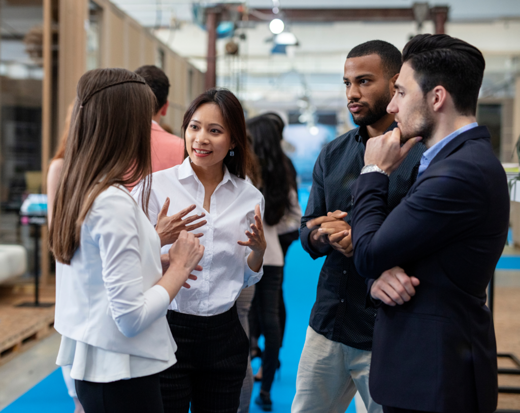 Job seekers conversing about the career fair expo